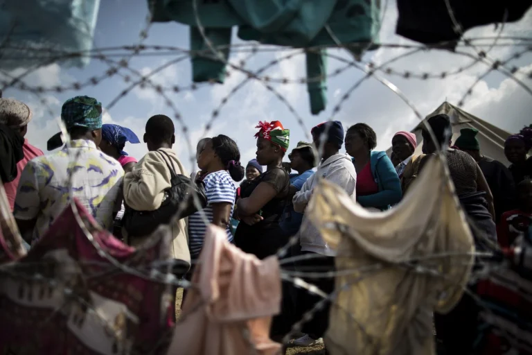 immigrants forming a line